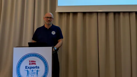 Peter Schmidt speaking at a community event